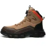 Men’s leather waterproof hiking boots with rugged soles and water-resistant finish.
