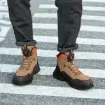 Men’s leather waterproof hiking boots with rugged soles and water-resistant finish.13