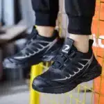 Stylish steel toe shoes for men and women with reinforced safety toe caps and lightweight breathable design.4