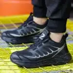 Stylish steel toe shoes for men and women with reinforced safety toe caps and lightweight breathable design.3