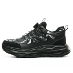 Black knob-lacing work trainers with steel toe, waterproof finish, and rugged outsole.