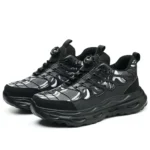 Black knob-lacing work trainers with steel toe, waterproof finish, and rugged outsole.13